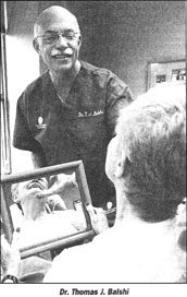 Dr Thomas Balshi with Patient