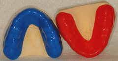 Custom sports guards are available in various colors